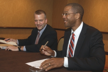 Acting ASFE, Christopher Smith, and Alaska Department of Natural Resources Commissioner, Dan Sullivan, sign an MOU at the LNG 17 Global Conference in Houston, Texas, pledging to work together in the effort to get more of Alaska's fossil fuels into the energy stream. Photo courtesy of LNG 17. Acting ASFE, Christopher Smith, and Alaska Department of Natural Resources Commissioner, Dan Sullivan, sign an MOU at the LNG 17 Global Conference in Houston, Texas, pledging to work together in the effort to get more of Alaska's fossil fuels into the energy stream. Photo courtesy of LNG 17.