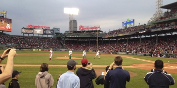 Secretary Moniz, far right, throws the first pitch at the Red Sox Earth Day game on April 22, 2014. | Photo by <a href="/node/716056">Marissa Newhall</a>, Energy Department. Secretary Moniz, far right, throws the first pitch at the Red Sox Earth Day game on April 22, 2014. | Photo by <a href="/node/716056">Marissa Newhall</a>, Energy Department.