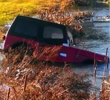 The Nov. 17 tornado forced a Jeep owned by an employee of DUF6 plant operator Babcock & Wilcox Conversion Services into a stormwater runoff ditch at the Paducah Gaseous Diffusion Plant site. The Nov. 17 tornado forced a Jeep owned by an employee of DUF6 plant operator Babcock & Wilcox Conversion Services into a stormwater runoff ditch at the Paducah Gaseous Diffusion Plant site.