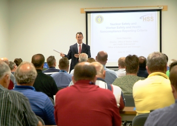 Kevin Dressman, director of the DOE Office of Worker Safety and Health Enforcement, addresses LATA Kentucky employees during a training session. The June regulatory assistance review was aimed at ensuring worker safety. Kevin Dressman, director of the DOE Office of Worker Safety and Health Enforcement, addresses LATA Kentucky employees during a training session. The June regulatory assistance review was aimed at ensuring worker safety.