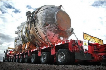 The Engineering Test Reactor vessel is shown here removed, loaded and ready for transport to the on-site landfill. The Engineering Test Reactor vessel is shown here removed, loaded and ready for transport to the on-site landfill.