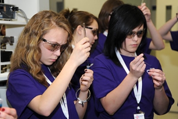 Students practice hooking out -- or removing -- DNA from a strawberry sample at Idaho National Laboratory. | Photo courtesy of INL. Students practice hooking out -- or removing -- DNA from a strawberry sample at Idaho National Laboratory. | Photo courtesy of INL.