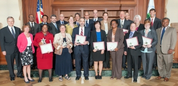 Members of the Interagency Five-Year Review Workgroup gather for a photo after receiving the Excellence in Partnership award from the EPA's Office of Solid Waste and Emergency Response on Sept. 18. The award recognizes the workgroup's collaborative effort in developing tools for the five-year reviews. DOE members of the workgroup include, front row, fourth from left, Gerald C. DiCerbo; fifth from left, Letitia OâConor; and seventh from left, Cliff Carpenter. Also pictured are, first row, first from left, EPA Associate Deputy Administrator Lisa Feldt, a former EM employee; far right, EPA Office of Solid Waste and Emergency Response Assistant Administrator Mathy Stanislaus; back row, first from left, EM Office of Site Restoration Assoc iate Deputy Assistant Secretary William Levitan; and second from left, Office of Health, Safety and Securityâs Office of Sustainability Support Director Josh Silverman. Members of the Interagency Five-Year Review Workgroup gather for a photo after receiving the Excellence in Partnership award from the EPA's Office of Solid Waste and Emergency Response on Sept. 18. The award recognizes the workgroup's collaborative effort in developing tools for the five-year reviews. DOE members of the workgroup include, front row, fourth from left, Gerald C. DiCerbo; fifth from left, Letitia OâConor; and seventh from left, Cliff Carpenter. Also pictured are, first row, first from left, EPA Associate Deputy Administrator Lisa Feldt, a former EM employee; far right, EPA Office of Solid Waste and Emergency Response Assistant Administrator Mathy Stanislaus; back row, first from left, EM Office of Site Restoration Assoc iate Deputy Assistant Secretary William Levitan; and second from left, Office of Health, Safety and Securityâs Office of Sustainability Support Director Josh Silverman.