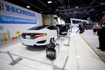 Hondaâs fuel cell concept car was unveiled in November 2014 and they predict sales of more than 1,000 vehicles per year for the next five years. Just like traditional internal combustion engines, most fuel cell electric vehicles have a driving range of up to 300 miles on one tank and refuel in less than 5 minutes. | Photo by Sarah Gerrity, Energy Department
Hondaâs fuel cell concept car was unveiled in November 2014 and they predict sales of more than 1,000 vehicles per year for the next five years. Just like traditional internal combustion engines, most fuel cell electric vehicles have a driving range of up to 300 miles on one tank and refuel in less than 5 minutes. | Photo by Sarah Gerrity, Energy Department