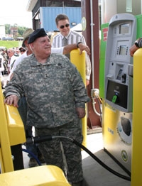 Major General Allen Tackett of the National Guard's 130th Airlift Wing dispenses the first fill-up of hydrogen fuel from the Yeager facility. Major General Allen Tackett of the National Guard's 130th Airlift Wing dispenses the first fill-up of hydrogen fuel from the Yeager facility.
