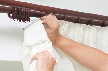 Installing blinds or draperies can help you save on cooling costs during the summer months. | Photo courtesy of ©iStockphoto.com/powershot
Installing blinds or draperies can help you save on cooling costs during the summer months. | Photo courtesy of ©iStockphoto.com/powershot
