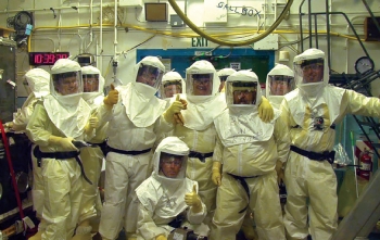 Team members gather for a photo after safely and successfully completing a complicated glove box separation. Team members gather for a photo after safely and successfully completing a complicated glove box separation.