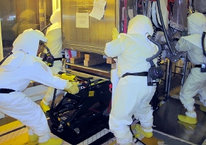 Workers separate highly contaminated glove boxes from their connection points in Hanfordâs Plutonium Finishing Plant. Workers separate highly contaminated glove boxes from their connection points in Hanfordâs Plutonium Finishing Plant.