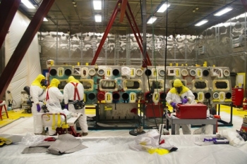 Advanced techniques allowed crews at Los Alamos National Laboratory to decontaminate large boxes of waste so it could be shipped as mixed low-level rather than transuranic waste. Advanced techniques allowed crews at Los Alamos National Laboratory to decontaminate large boxes of waste so it could be shipped as mixed low-level rather than transuranic waste.