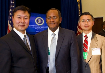 EMâs John Moon, left to right, Melvin G. Williams, Jr., former Associate Deputy Secretary of Energy, and EMâs Ming Zhu at the AAGEN SES Development Program kickoff in March 2012 at the White House. EMâs John Moon, left to right, Melvin G. Williams, Jr., former Associate Deputy Secretary of Energy, and EMâs Ming Zhu at the AAGEN SES Development Program kickoff in March 2012 at the White House.