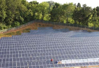 Efficient Energy of Tennessee installs panels at a 1-MW solar farm outside Knoxville in July. | Photo by Harvey Abouelata and courtesy of Efficient Energy of Tennessee Efficient Energy of Tennessee installs panels at a 1-MW solar farm outside Knoxville in July. | Photo by Harvey Abouelata and courtesy of Efficient Energy of Tennessee