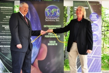 Oak Ridge Mayor Tom Beehan, left, and RSI Vice President Rick Ferguson pose for photos at a May 2012 ceremony for an RSI solar farm at DOEâs East Tennessee Technology Park. Oak Ridge Mayor Tom Beehan, left, and RSI Vice President Rick Ferguson pose for photos at a May 2012 ceremony for an RSI solar farm at DOEâs East Tennessee Technology Park.