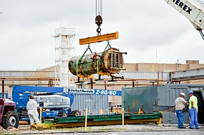 A 10,000-pound cold trap is lifted and boxed in a container for on-site storage at Paducah. A 10,000-pound cold trap is lifted and boxed in a container for on-site storage at Paducah.