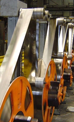 Giant spools at Metglas' facility in Conway, S.C., hold the thin metal alloy used in the cores of Amorphous Metal Transformers. | Photo courtesy of Metglas Giant spools at Metglas' facility in Conway, S.C., hold the thin metal alloy used in the cores of Amorphous Metal Transformers. | Photo courtesy of Metglas