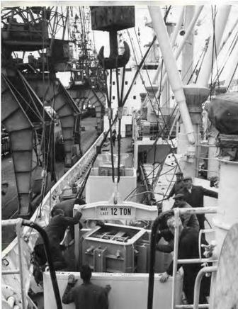 A view of the first cask of reactor fuel from Sweden being unloaded from the m.s. Odensholm on July 21, 1963 in Savannah, Ga. A view of the first cask of reactor fuel from Sweden being unloaded from the m.s. Odensholm on July 21, 1963 in Savannah, Ga.
