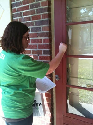 A volunteer canvasses the Mt. Washington neighborhood to spread awareness about home energy audits in the area. | Photo Courtesy GCEA A volunteer canvasses the Mt. Washington neighborhood to spread awareness about home energy audits in the area. | Photo Courtesy GCEA