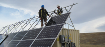 Subcontractor personnel install solar panels and other infrastructure on a 40-foot conex box that houses the batteries and control equipment for the 6 kilowatt photovoltaic system that powers the ETPTS groundwater treatment system. Subcontractor personnel install solar panels and other infrastructure on a 40-foot conex box that houses the batteries and control equipment for the 6 kilowatt photovoltaic system that powers the ETPTS groundwater treatment system.