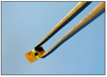 A tiny Semprius HCPV cell, mounted on an interposer. Each cell is only 0.6mm on one side. | Photo courtesy of Semprius A tiny Semprius HCPV cell, mounted on an interposer. Each cell is only 0.6mm on one side. | Photo courtesy of Semprius