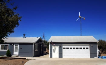 A small wind turbine can produce enough energy to cover the electricity costs of the average American home. | Photo from Bergey Windpower Co., Inc.; NREL 13830 A small wind turbine can produce enough energy to cover the electricity costs of the average American home. | Photo from Bergey Windpower Co., Inc.; NREL 13830