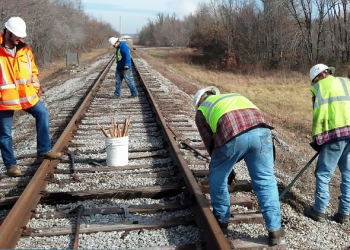 Employees with Swift & Staley Inc., a Paducah site small business contractor, repair a railroad on the site. Employees with Swift & Staley Inc., a Paducah site small business contractor, repair a railroad on the site.