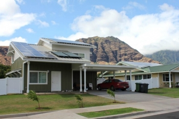 All Kaupuni Village homes in Oahu, Hawaii, incorporate energy efficiency and renewable energy technologies to produce as much energy as they consume. Credit: Kenneth Kelly, NREL. All Kaupuni Village homes in Oahu, Hawaii, incorporate energy efficiency and renewable energy technologies to produce as much energy as they consume. Credit: Kenneth Kelly, NREL.