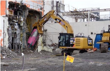 Demolition continues in April 2013 with removal of internal components and concrete cell walls. Demolition continues in April 2013 with removal of internal components and concrete cell walls.