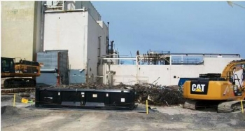 Debris is removed following demolition. Debris is removed following demolition.