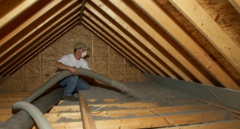Cellulose, a fiber insulation material with a high recycled content, is blown into a home attic. | Photo courtesy of Cellulose Insulation Manufacturers Association. Cellulose, a fiber insulation material with a high recycled content, is blown into a home attic. | Photo courtesy of Cellulose Insulation Manufacturers Association.