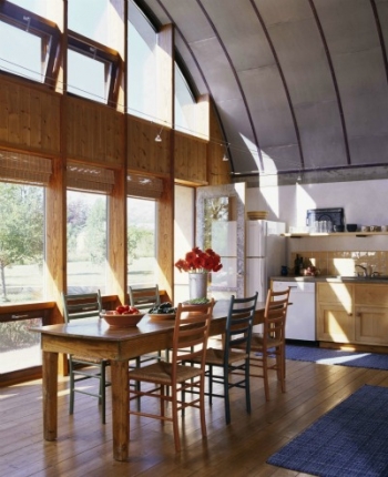 Energy-efficient windows provide space heating and lighting to this sunny kitchen. | Photo courtesy of Emily Minton-Redfield for Jim Logan Architects.
Energy-efficient windows provide space heating and lighting to this sunny kitchen. | Photo courtesy of Emily Minton-Redfield for Jim Logan Architects.