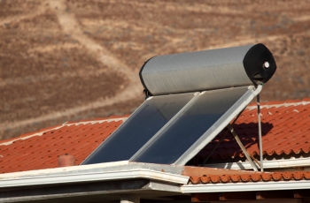 Rooftop solar water heaters need regular maintenance to operate at peak efficiency. | Photo from iStockphoto.com Rooftop solar water heaters need regular maintenance to operate at peak efficiency. | Photo from iStockphoto.com
