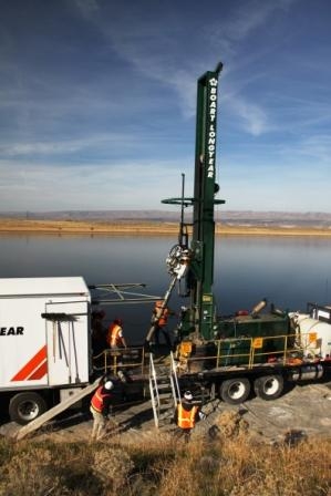 Workers drilled 171 wells along the shoreline of the Columbia River, which runs through the Site. The new wells will help extend a chemical groundwater barrier in the soil by half a mile along the river to contain radioactive contamination in the groundwater (strontium-90). Workers drilled 171 wells along the shoreline of the Columbia River, which runs through the Site. The new wells will help extend a chemical groundwater barrier in the soil by half a mile along the river to contain radioactive contamination in the groundwater (strontium-90).