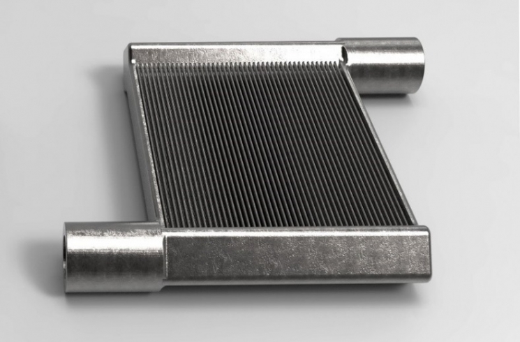 The University of Maryland used direct metal printing—a 3D printing technology—to manufacture a unique miniaturized air-to-refrigerant heat exchanger as a single, continuous piece. Image: University of Maryland, Center for Environmental Energy Engineering. The University of Maryland used direct metal printing—a 3D printing technology—to manufacture a unique miniaturized air-to-refrigerant heat exchanger as a single, continuous piece. Image: University of Maryland, Center for Environmental Energy Engineering.
