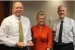 EMCBC Director Jack Craig, left to right, EM Executive Assistant Jillian Carter, who is EM's Feds Feed Families representative, and Senior Advisor for Environmental Management David Huizenga pause for a photo Nov. 8. Craig holds the "Teamwork Award" he and his staff received.