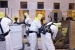 Crews repackage waste from a fiberglass-reinforced plywood box into a container that can be shipped to WIPP.