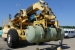 This cylinder hauler at Paducah’s Babcock & Wilcox Conversion Services plant delivers the first of DOE’s 14-ton depleted uranium cylinders to USEC for re-enrichment as part 
of a five-party agreement that is extending enrichment operations at the 60-year-old plant for another year, delaying increased costs at the site for DOE.