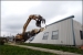 A building is demolished at the Weldon Spring, Missouri, Site.