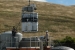 Employees load transuranic waste into a shipping container at Vallecitos Nuclear Center