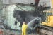 Crews perform demolition of the R-MAD facility. R-MAD is one of several Nevada National Security Site facilities which supported the nuclear rocket program that ended in 1973
