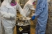 Recovery Act workers at Alpha 5 at the Y-12 National Security Complex at Oak Ridge, Tenn., survey waste as part of the characterization process to determine its proper disposition path