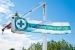 A Savannah River Nuclear Solutions employee hangs one of several “Safety Begins with Me” banners near a Savannah River Site entrance.