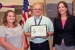 DOE Carlsbad Field Office (CBFO) Deputy Manager Ed Ziemianski presents the Green Zia Program Silver Level Leader award from the New Mexico Environment Department. Ziemianski is shown with Lynn Johnson (left), of Washington TRU Solutions LLC, the Waste Isolation Pilot Plant (WIPP) management and operating contractor, Regulatory Compliance, and CBFO Environmental Protection Specialist Susan McCauslin, program lead for the WIPP team.