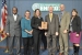 Award ceremony (left to right): Melvin G. Williams, Jr., Associate Deputy Secretary, U.S. Department of Energy (DOE); 
Mary Sizemore, Environmental Management System (EMS) Coordinator, Office of Legacy Management (LM) contractor; 
Tracy Ribeiro, EMS Coordinator, LM; Tom Pauling, Director of Site Operations, LM; Dave Geiser, Director, LM; and 
Jennifer MacDonald, Director, Sustainability Performance Office, DOE.