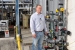 Chromium Water Treatment System Facility Manager Matt Finley stands near one of the facility’s ground wells.