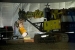 A waste retrieval facility constructed over a former buried radioactive waste disposal cell known as Pit 9 at the Idaho site has been repurposed for treating 6,000 drums of sludge waste left over from the Cold War weapons program.