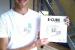 Pieter Jan De Loof, a student at Ghent University, displays the assembly instructions for E-Cube, Team Belgium’s entry to the U.S. Department of Energy Solar Decathlon 2011.