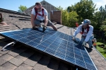 Home solar systems can save you energy and money. | Photo courtesy of Dennis Schroeder, NREL 22168. 