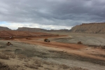 A sheep’s foot roller compacts the tailings in the disposal cell.