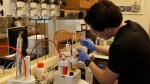 Jonathan Peters, a researcher at RTI International (an ARPA-E awardee), characterizes the water content of a bio-oil sample. | Courtesy of RTI International.