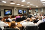 DOE employees and ECA members discuss the Department's Asset Revitalization Initiative.