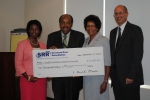 Savannah River Remediation presents a $10,000 to South Carolina State University  to support its Nuclear Engineering Program. In the photo, from left: Kayla Miller, Savannah River Remediation Procurement Department and South Carolina State University 2010 graduate; Dr. John Corbitt, Acting Chairman of the South Carolina State University Board of Trustees; Dr. Cynthia Warrick, Interim South Carolina State University President; and Dave Olson, Savannah River Remediation President and Project Manager.